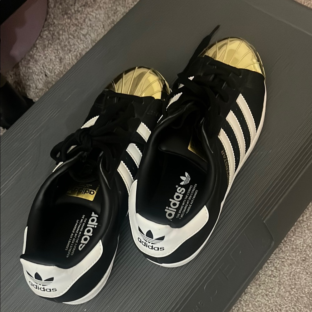 Adidas Black and Gold Sneakers